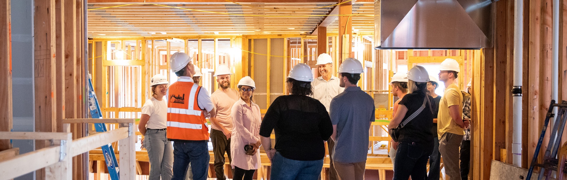 Master of Science in Real Estate Development students tour a buildnig under construction. 