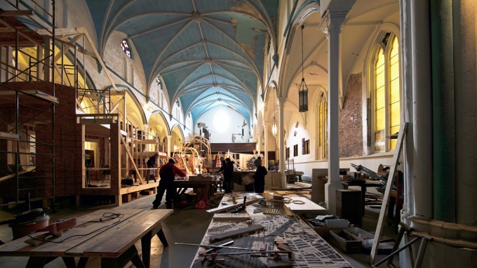 Students work inside a vacant church in Buffalo on projects that will remake the space. 