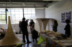 By assembling a series of pulp-based cones the students created a spatial dynamic with interesting an acoustical effect - underneath the canopy, sound is muted. 