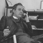 Dean Eberhard sitting at his desk during the early days of the School of Architecture and Planning. 