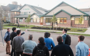 Students tour affordable housing while on a studio trip. 