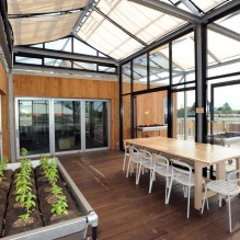 A photo of UB's GRoW Home, featuring a solar-panel roof and thermally insulated walls. 