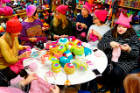 A group of women gather at Knitty City in New York on January 17, 2017 to make their pink Pussyhats in preparation for protests, in Washington and New York, for women's rights following the election of Donald Trump. / AFP PHOTO / William EDWARDSWILLIAM EDWARDS/AFP/Getty Images