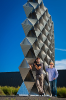 UB architecture professors Nicholas Bruscia (left) and Christopher Romano (right) at the site of their structure, "Project 2XmT," in Silo City (2013). A collaboration with Rigidized Metals, the award-winning sculptural assembly of self-supporting metal panels tested the structural limits of thin-guage sheet metal. Photo by Douglas Levere