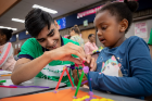 The UB Regional Institute and students from the School of Architecture and Planning guided children through a fun, hands-on activity aimed at soliciting ideas for a play garden in the the park, 2019. (c) University at Buffalo, photo by Meredith Forrest-Kulwicki